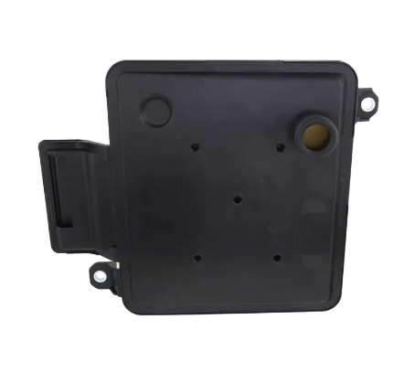 Top view of a plastic 850RE transmission filter on a white background