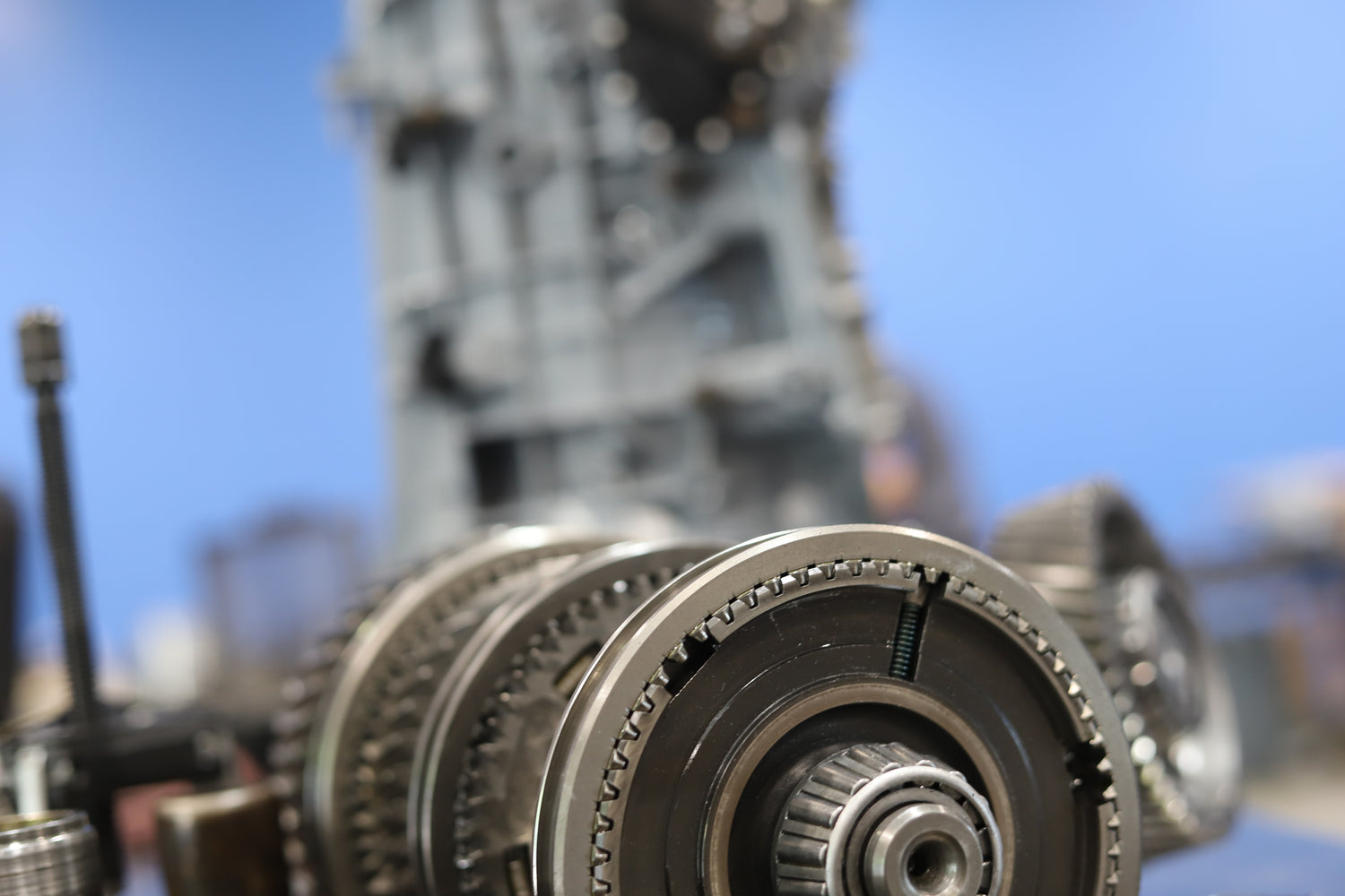 Up close photo of a transmission rebuild, shows internal components of clutches and gears