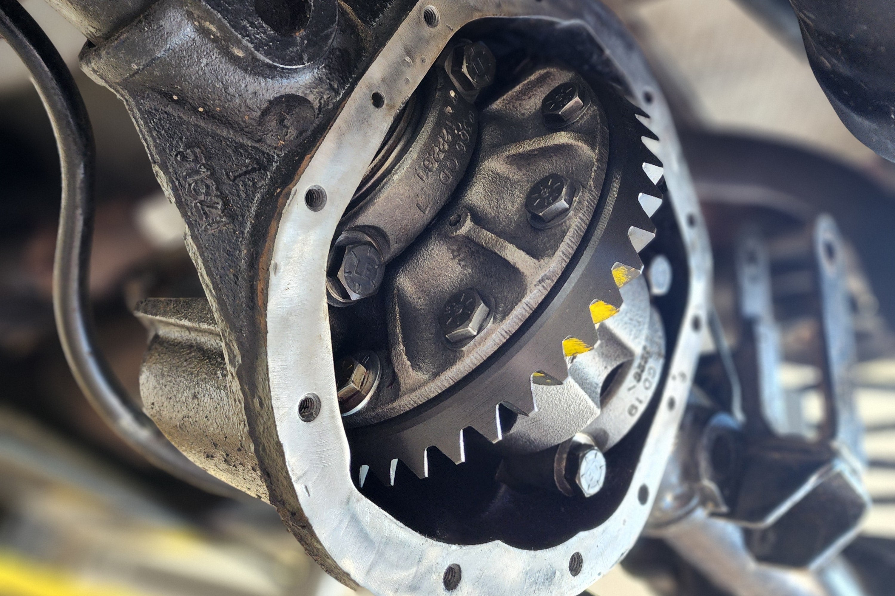 Close-up of a rear differential during repair on a vehicle