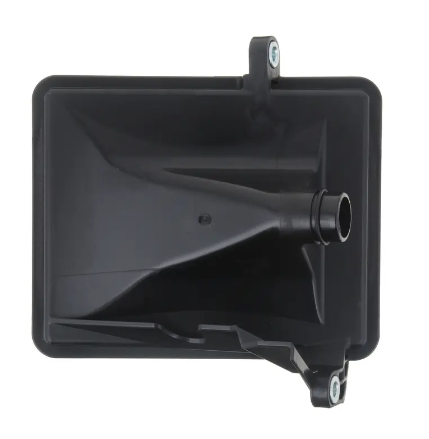 Bottom view of black Honda transmission filter on white background